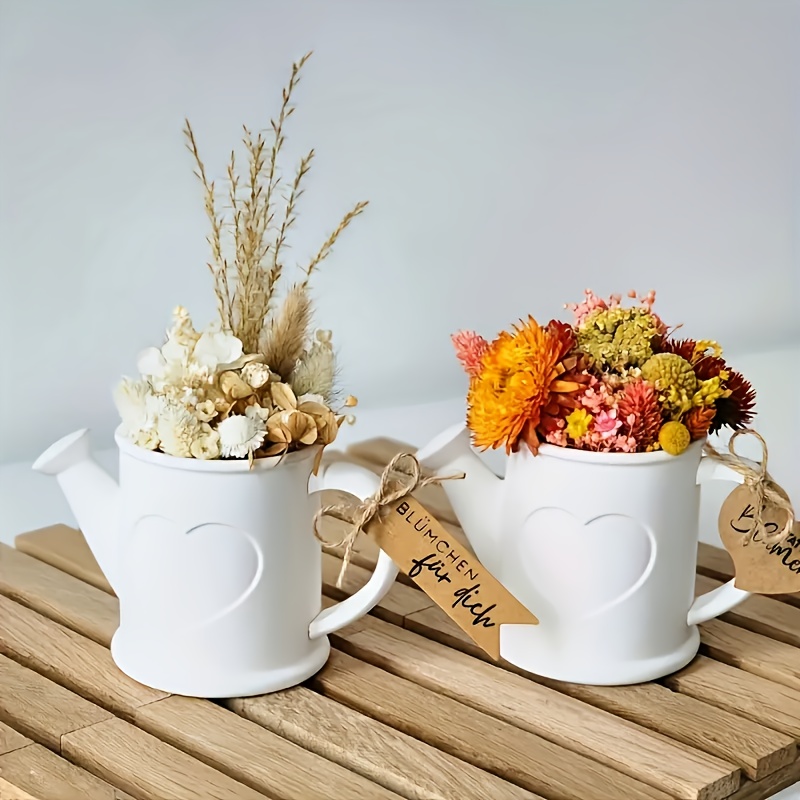 じょうろの形のシリコン型とハート型のキャンドルホルダーの2点 - Candle Making Vessels のレビューと価格